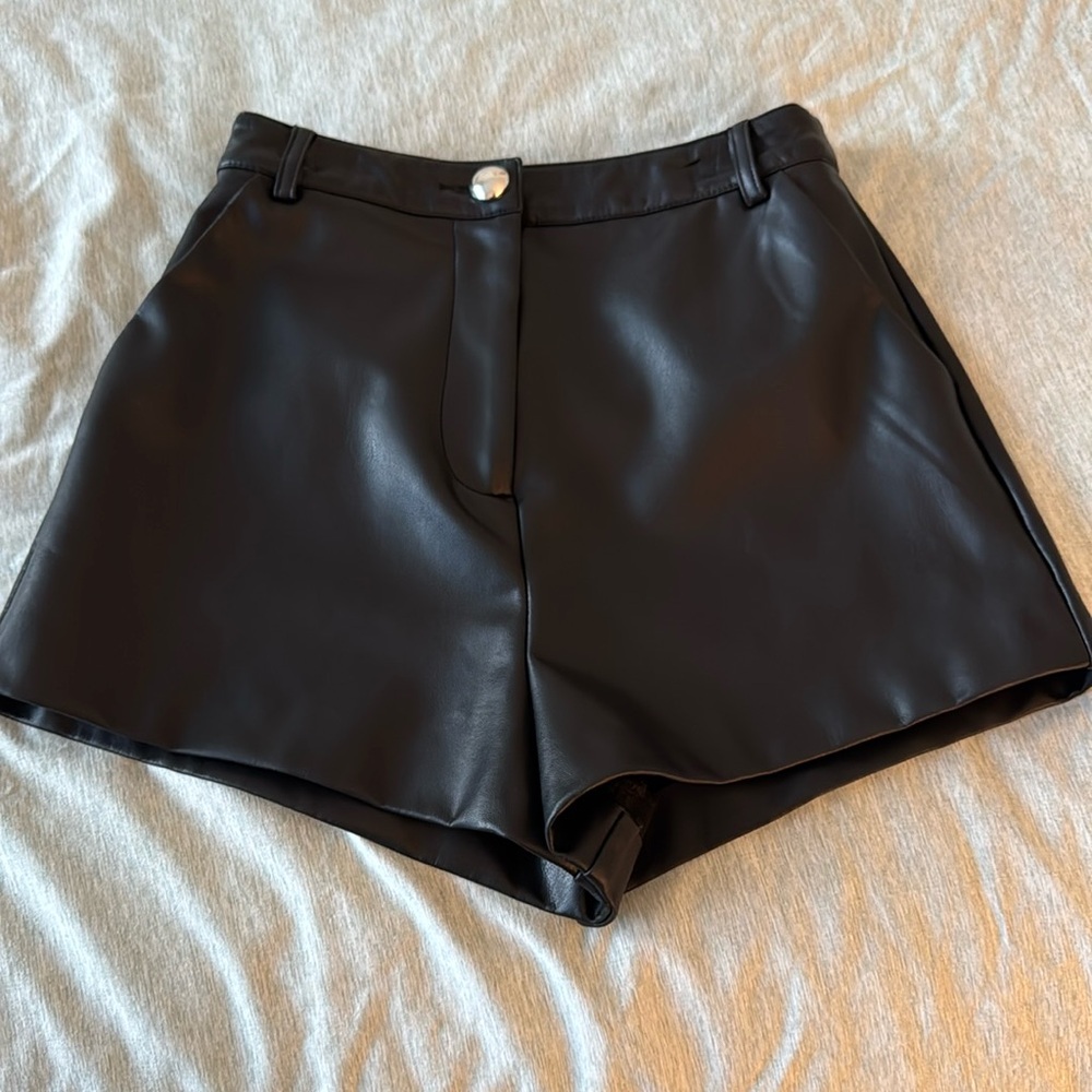 Black faux leather shorts